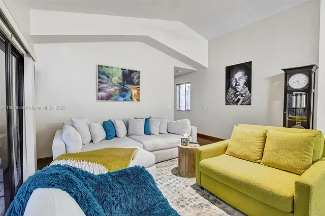 a living room with furniture and a couch