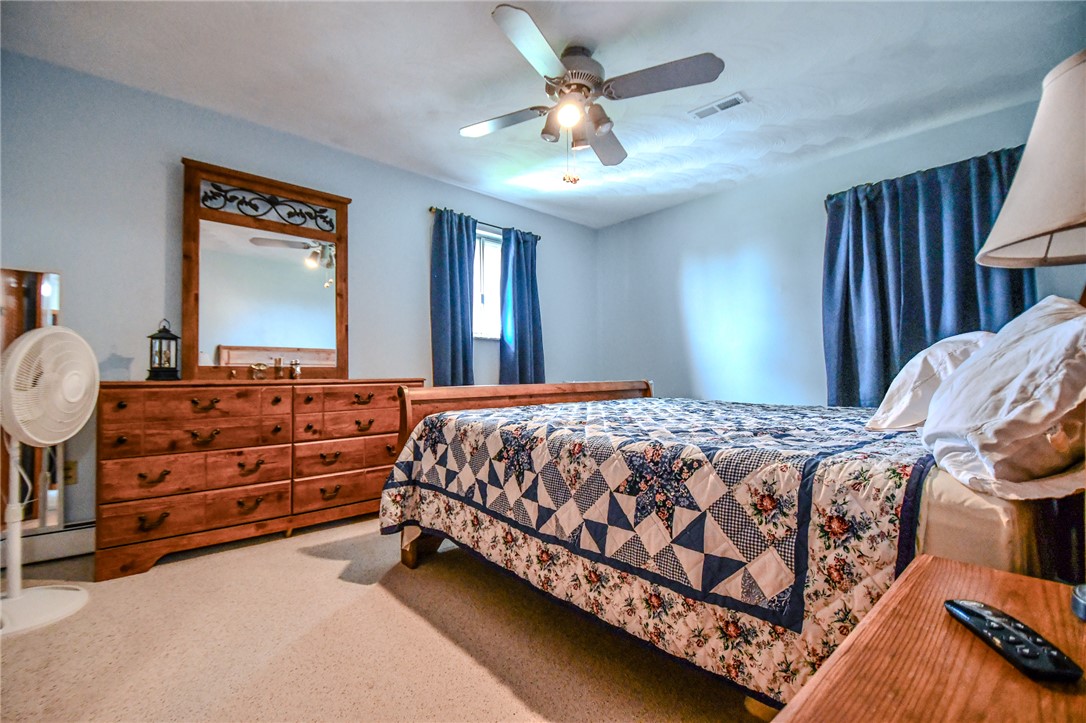 10833 Kendig Road Medway, OH 45341 - Photo 21 of 46 This restful bedroom offers a spacious retreat with soft carpeting and ample natural light.
