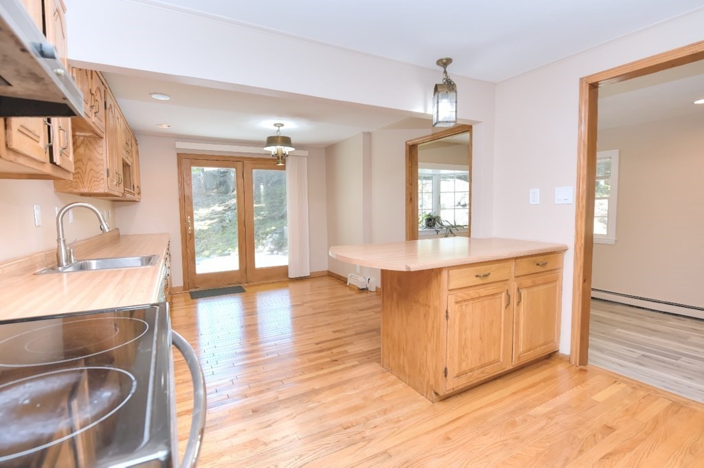 165 R Green Street Stoneham, MA 02180 - Photo 14 of 42 a spacious bathroom with a sink double vanity and a mirror