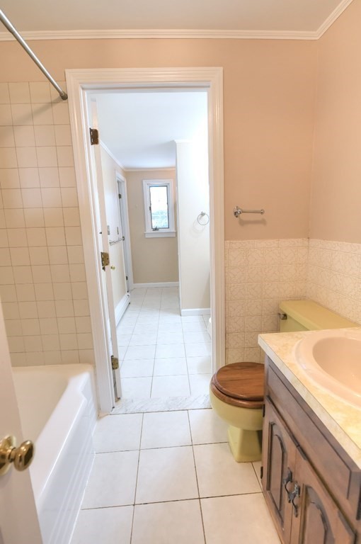 165 R Green Street Stoneham, MA 02180 - Photo 28 of 42 a bathroom with a sink a toilet and shower