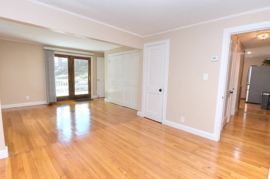 165 R Green Street Stoneham, MA 02180 - Photo 30 of 42 wooden floor in an empty room with a window