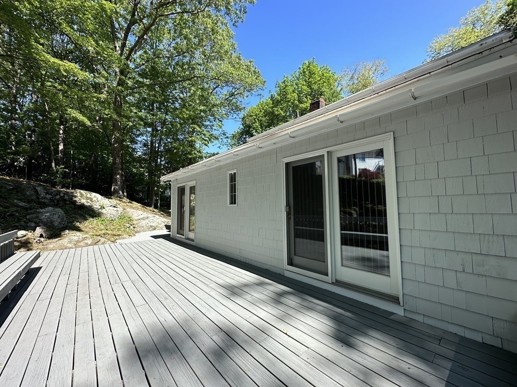 165 R Green Street Stoneham, MA 02180 - Photo 7 of 42 a view of backyard with a deck