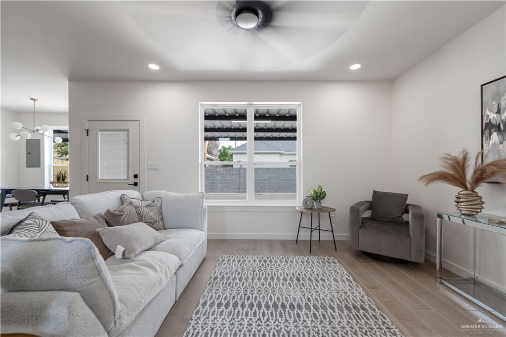 5408 North Crown Point Pharr, TX 78577 - Photo 2 of 19 a living room with furniture and a window
