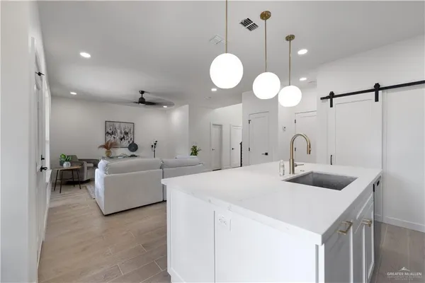 a view of entryway with wooden floor and stairs