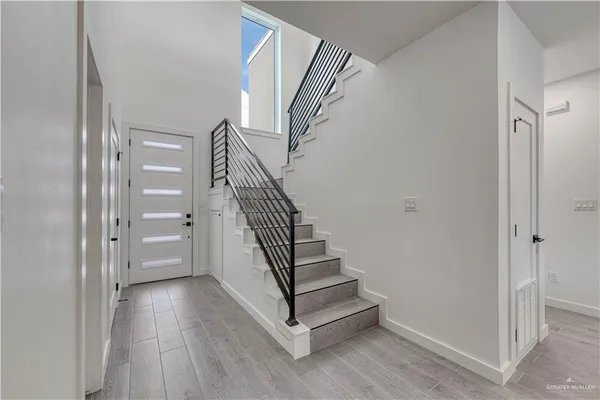 a bedroom with a bed and a table