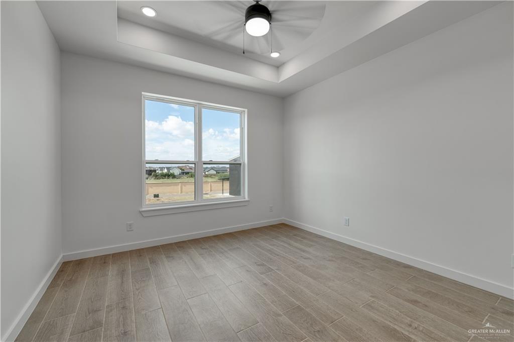 5408 North Crown Point Pharr, TX 78577 - Photo 10 of 19 an empty room with a window