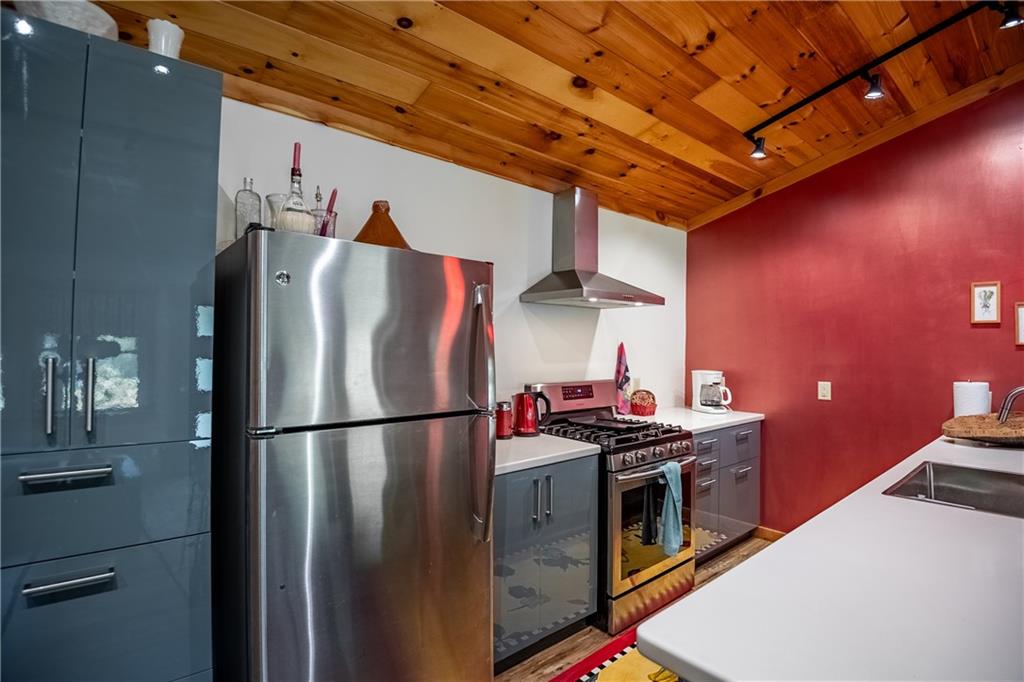 470 Truitt Road Kennerdell, PA 16374 - Photo 12 of 49 Kitchen, propane gas stove, stainless refrigerator