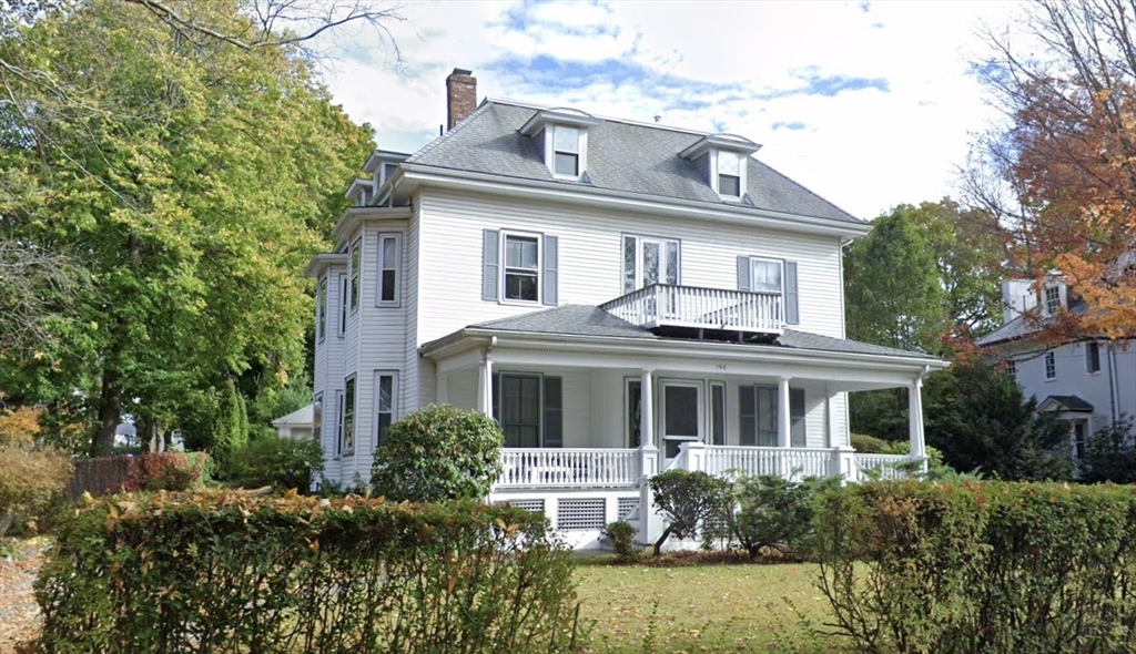 156 Park Street, Unit 3 Newton, MA 02458 - Photo 1 of 10 a front view of a house with garden