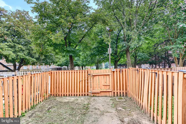 a view of a wooden fence