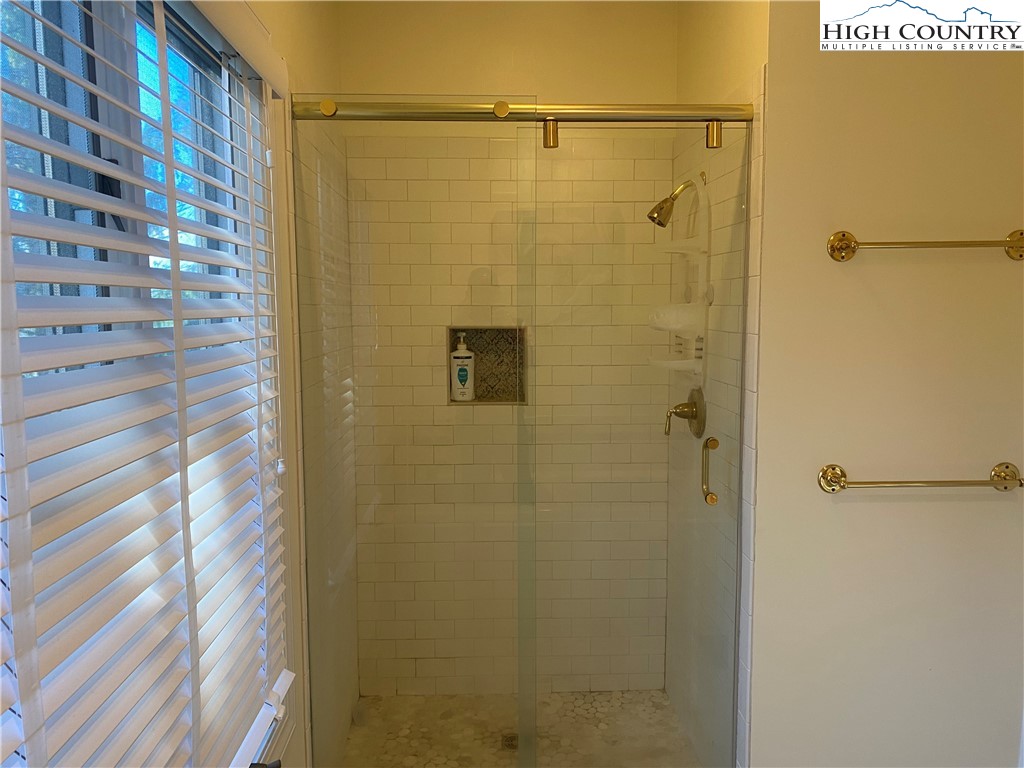 148 North Ridge Circle, Unit B Boone, NC 28607 - Photo 24 of 36 a bathroom with a shower