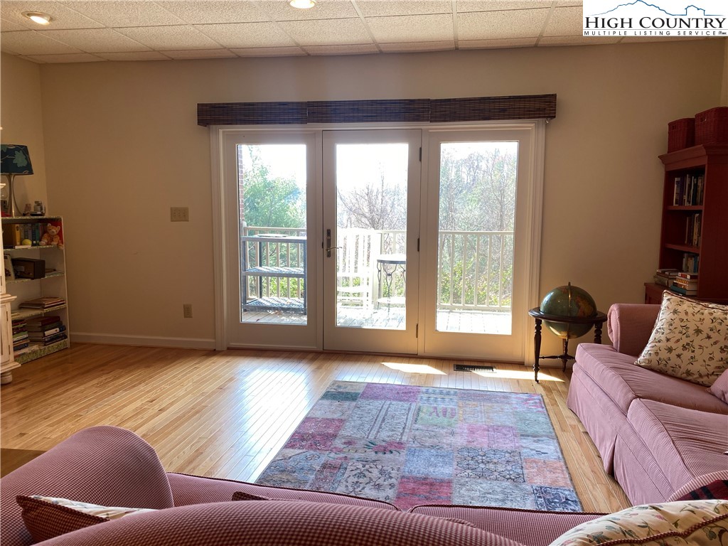 148 North Ridge Circle, Unit B Boone, NC 28607 - Photo 29 of 36 a living room with furniture and a large window