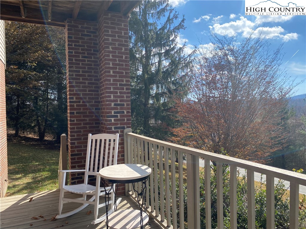 148 North Ridge Circle, Unit B Boone, NC 28607 - Photo 31 of 36 a view of a balcony with two chairs and a table