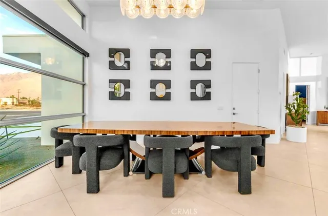 a living room with fireplace furniture and a flat screen tv