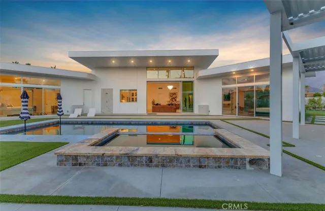 a view of an outdoor sitting area with a tub