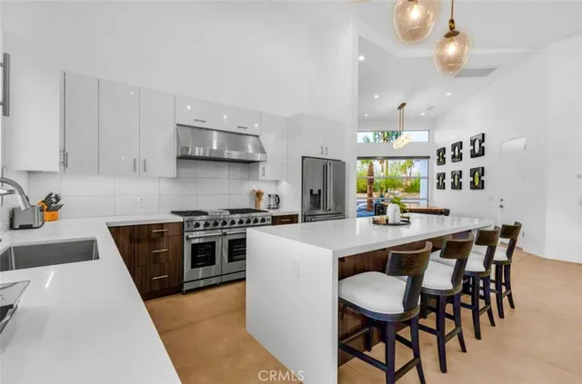 a bed room with bed and a large window