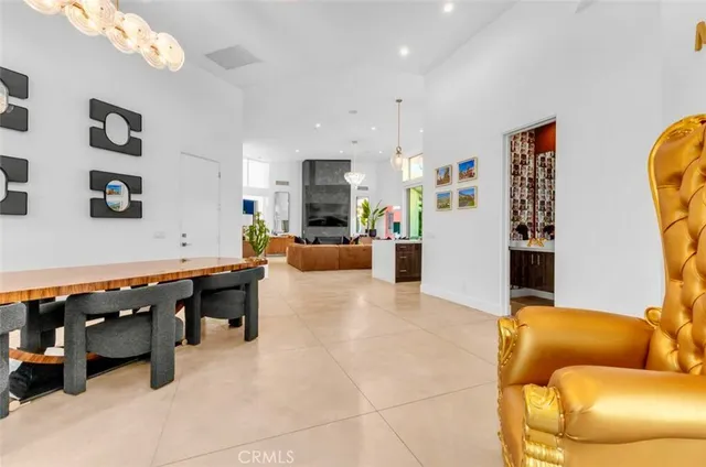 a view of swimming pool with outdoor seating and a terrace view