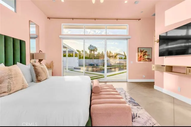 a view of an house with swimming pool yard and outdoor seating