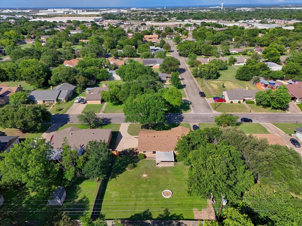 141 Travis Lane Hewitt, TX 76643 - Photo 29 of 31 Aerial perspective showcasing a residential area with numerous mature trees