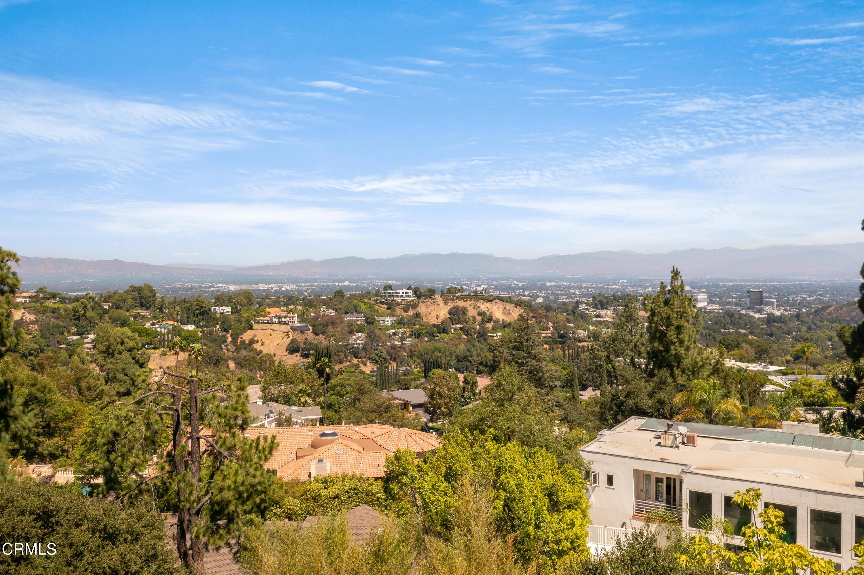 16274 Dorilee Lane Encino, CA 91436 - Photo 20 of 23 an aerial view of residential houses with city view
