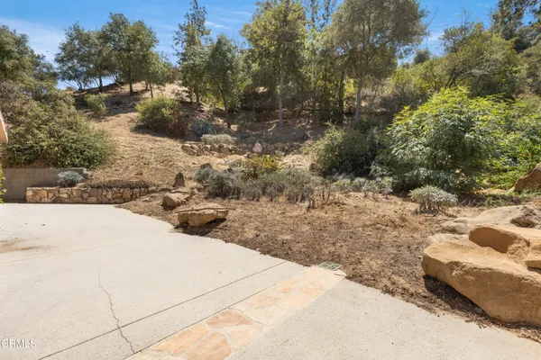a view of a yard covered in snow