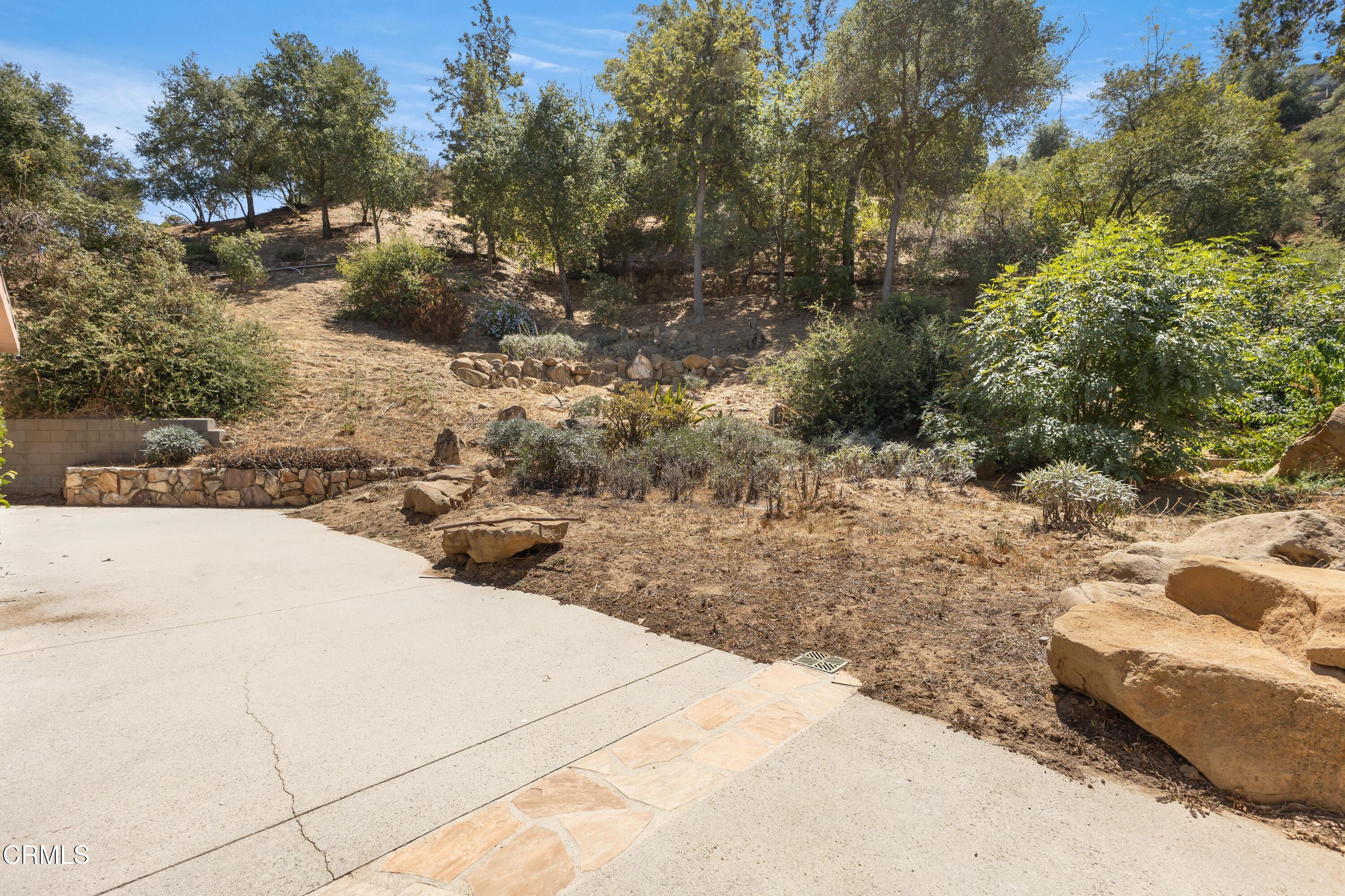 16274 Dorilee Lane Encino, CA 91436 - Photo 22 of 23 a view of a yard covered in snow