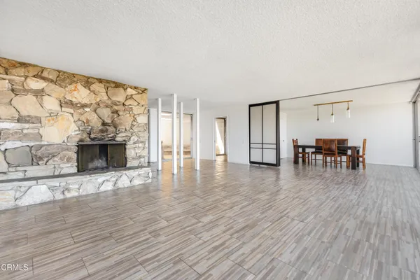 a view of livingroom with furniture and wooden floor