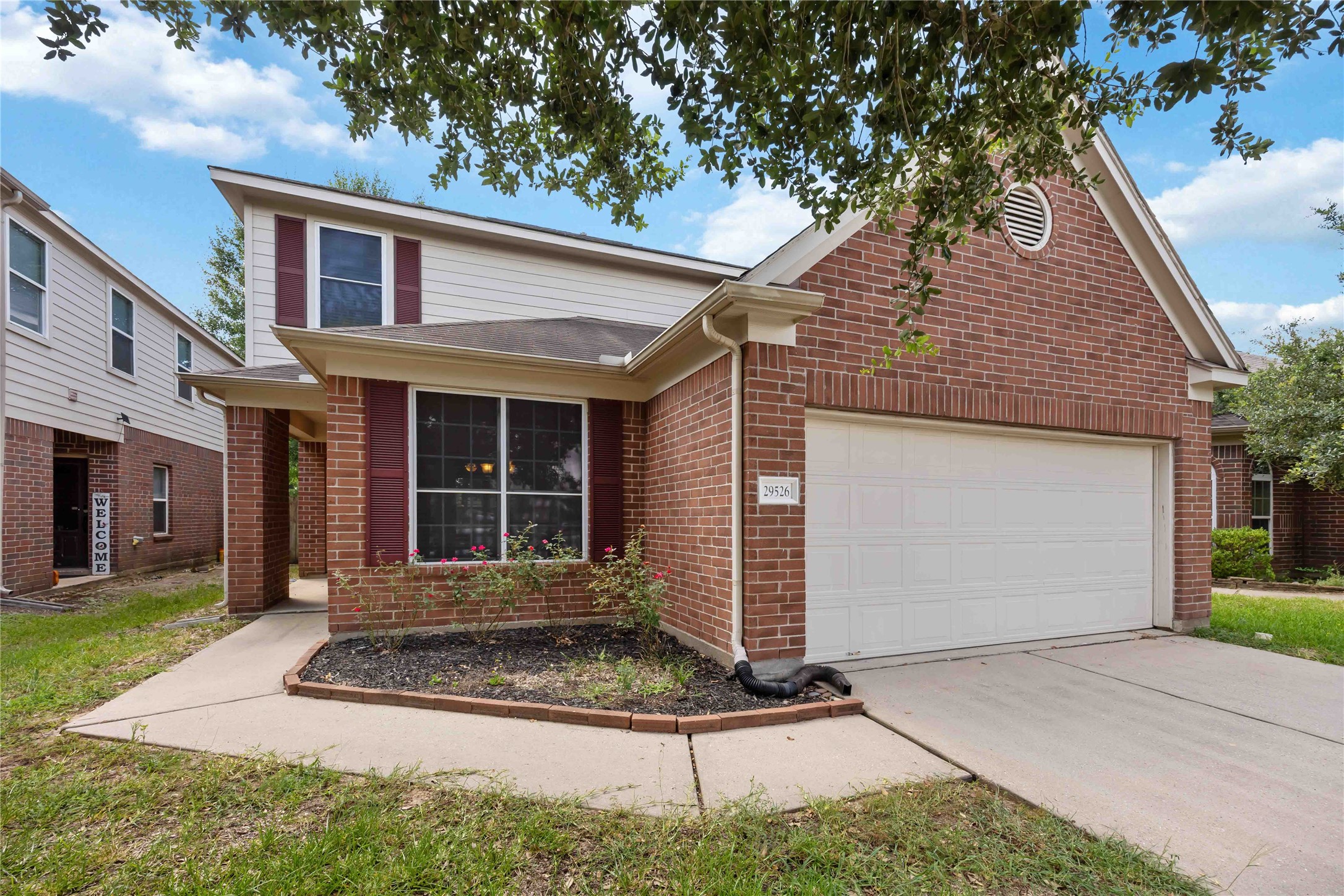 29526 Winton Wood Way Spring, TX 77386 - Photo 29 of 29 Covered front porch, mature shade trees, landscaped flower bed!
