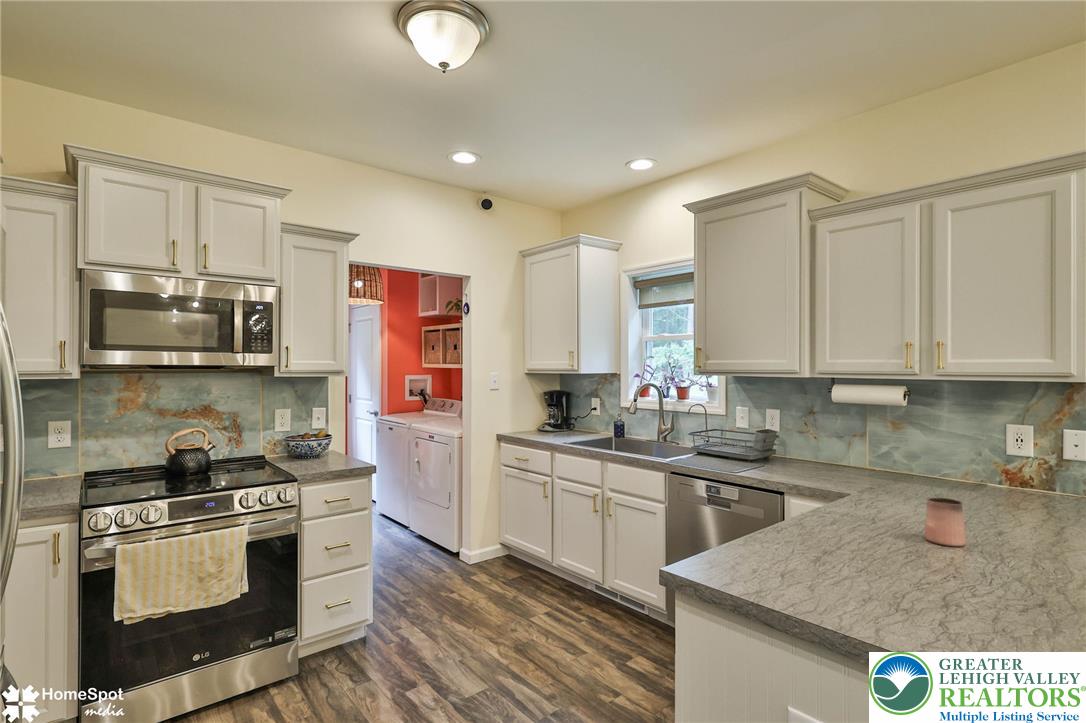 318 Church Road Kunkletown, PA 18058 - Photo 20 of 51 A well-appointed culinary space featuring sleek stainless steel appliances and ample cabinetry.