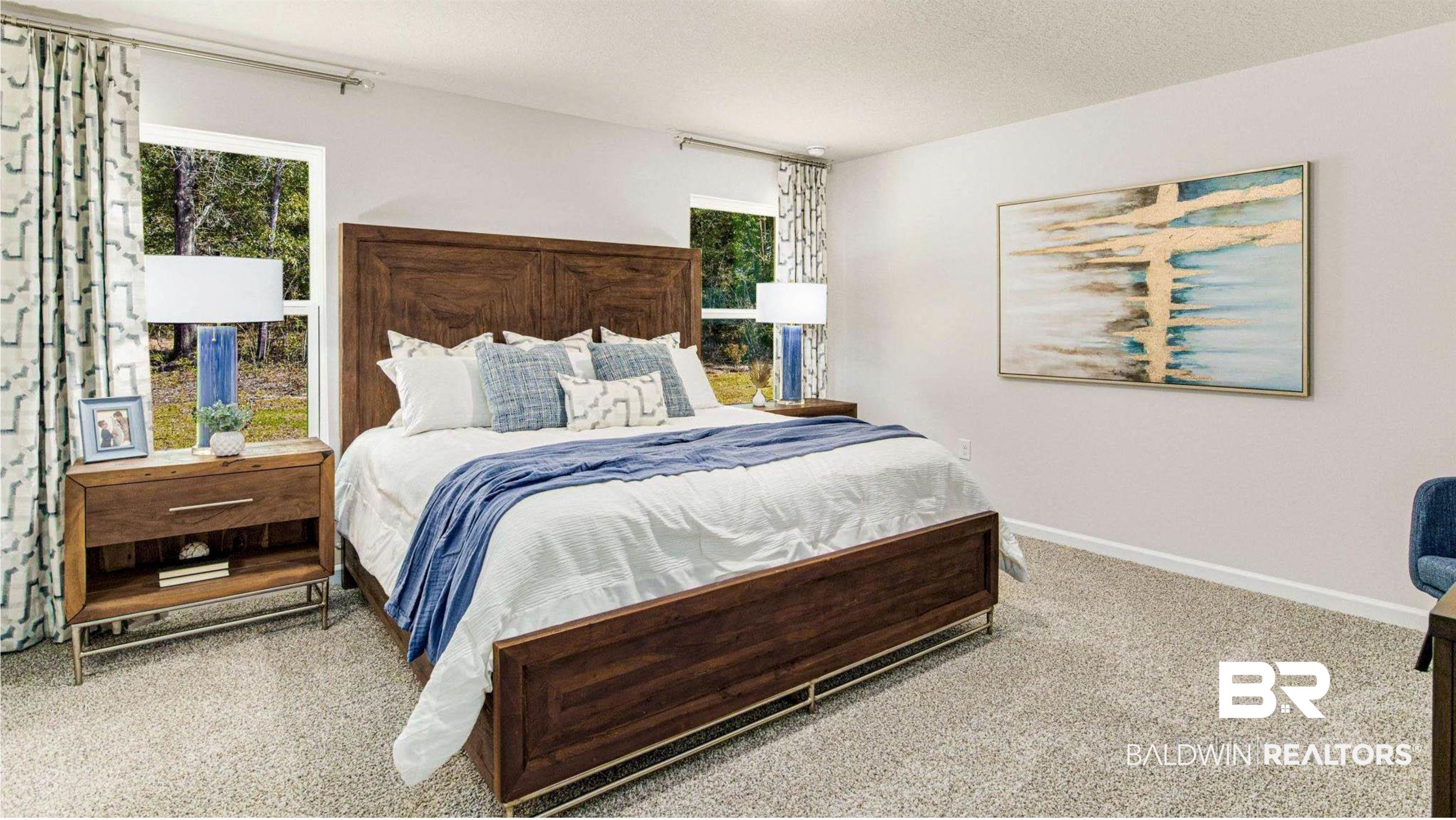 1040 Hayward Loop Foley, AL 36535 - Photo 19 of 35 Light-filled bedroom featuring two large windows and neutral carpeting