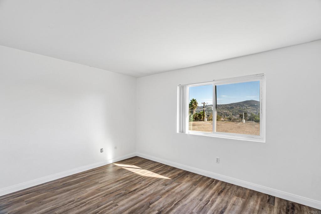 2964 Crane Street, Unit A B Lemon Grove, CA 91945 - Photo 14 of 50 an empty room with a window
