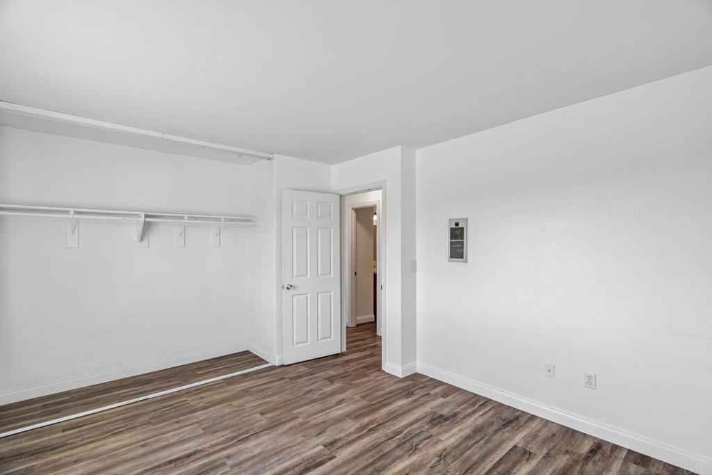 2964 Crane Street, Unit A B Lemon Grove, CA 91945 - Photo 15 of 50 a view of an empty room with wooden floor