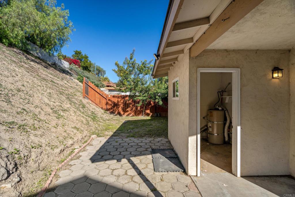 2964 Crane Street, Unit A B Lemon Grove, CA 91945 - Photo 17 of 50 a view of a back yard