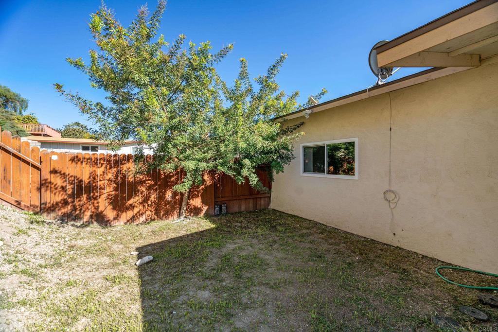 2964 Crane Street, Unit A B Lemon Grove, CA 91945 - Photo 21 of 50 a view of a backyard