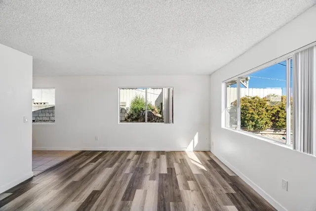 a view of an empty room and window