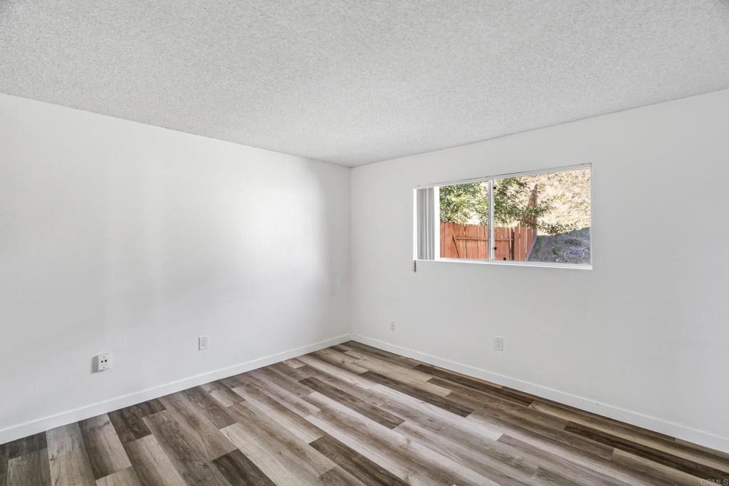 2964 Crane Street, Unit A B Lemon Grove, CA 91945 - Photo 34 of 50 a view of a room that has a window