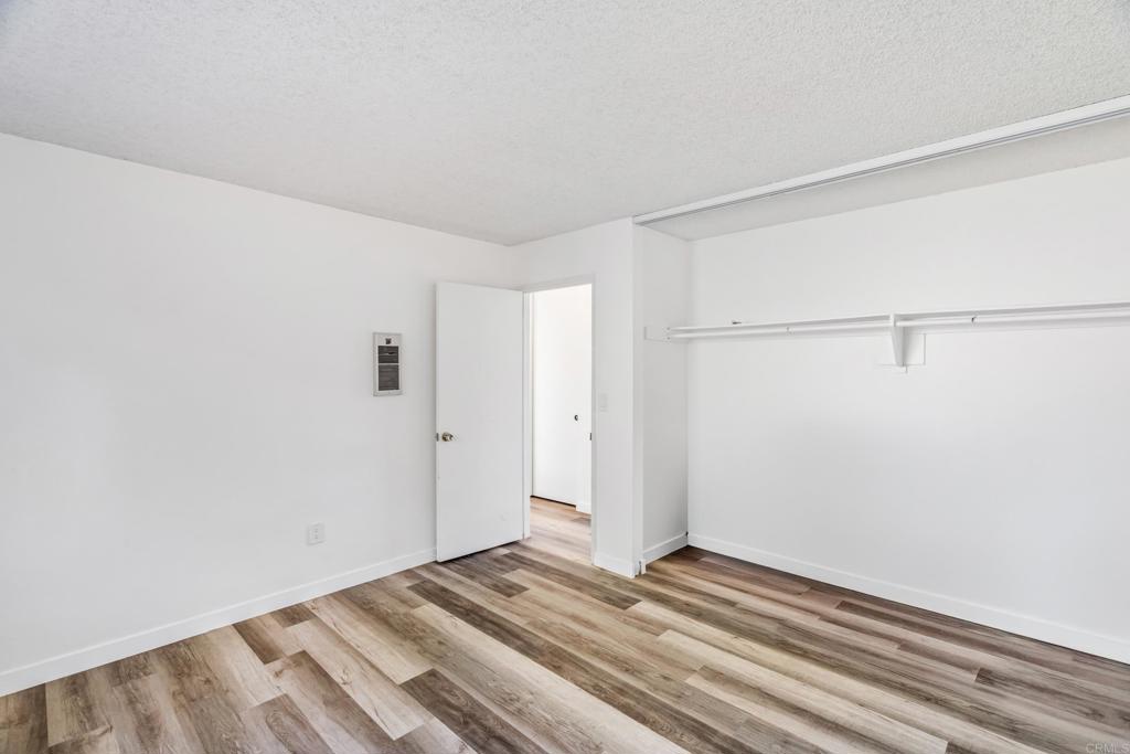 2964 Crane Street, Unit A B Lemon Grove, CA 91945 - Photo 36 of 50 a view of a room with wooden floor