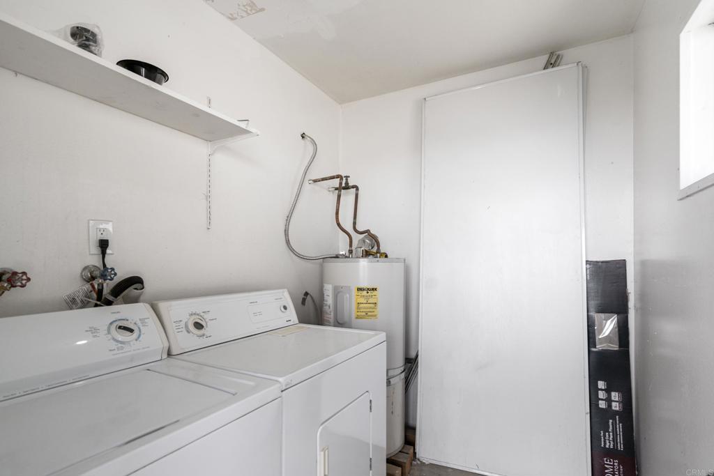 2964 Crane Street, Unit A B Lemon Grove, CA 91945 - Photo 37 of 50 a utility room with dryer and washer