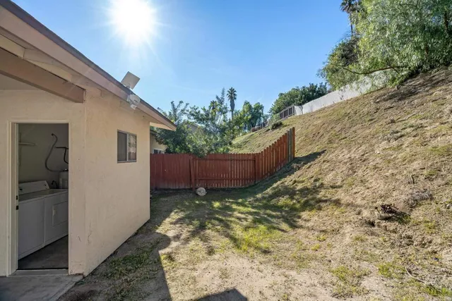 a view of a backyard with plants