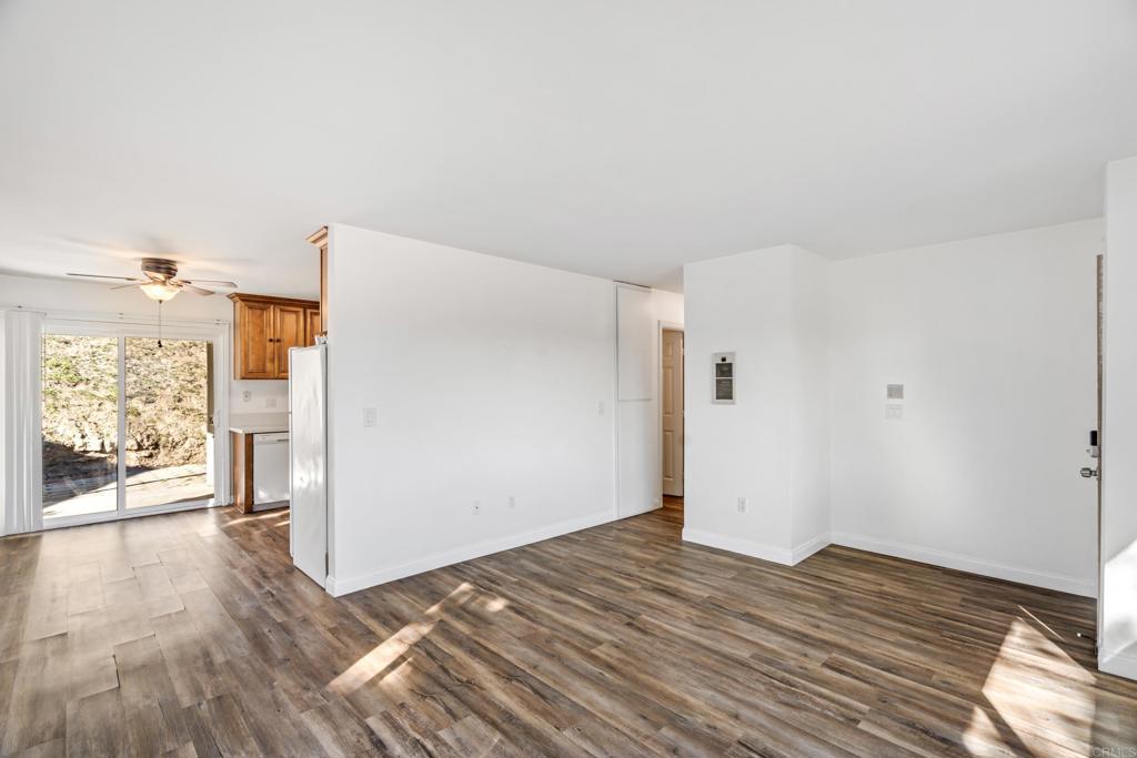 2964 Crane Street, Unit A B Lemon Grove, CA 91945 - Photo 4 of 50 a view of a room with wooden floor and a window