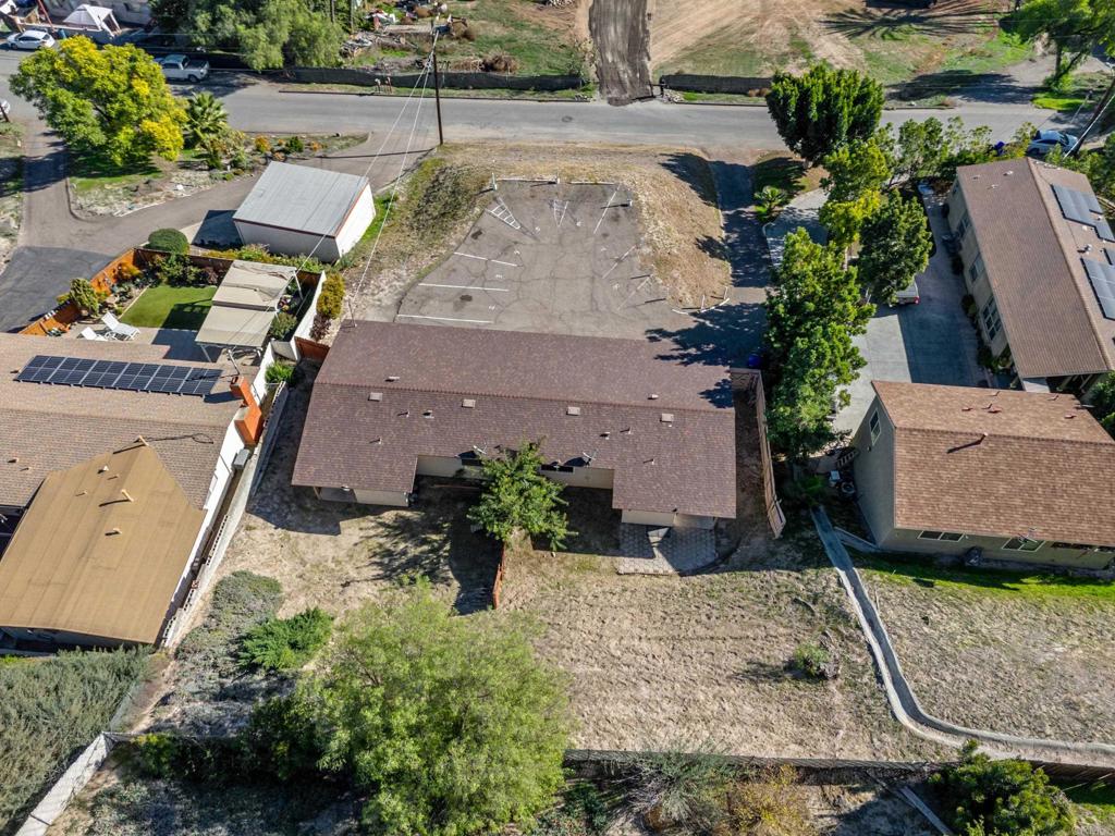 2964 Crane Street, Unit A B Lemon Grove, CA 91945 - Photo 47 of 50 an aerial view of a house with a yard