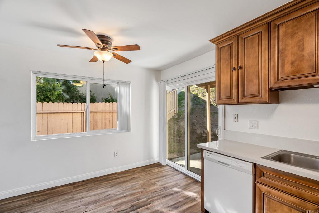 2964 Crane Street, Unit A B Lemon Grove, CA 91945 - Photo 10 of 50 a kitchen with a wooden floor and window