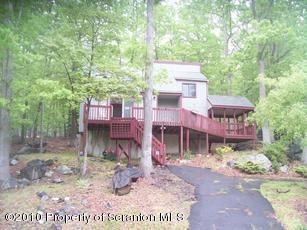 2759 Decker Road Bushkill, PA 18324 - Photo 1 of 1 a front view of a house with a yard