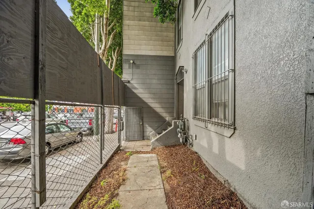 a view of a balcony with wooden floor and stairs