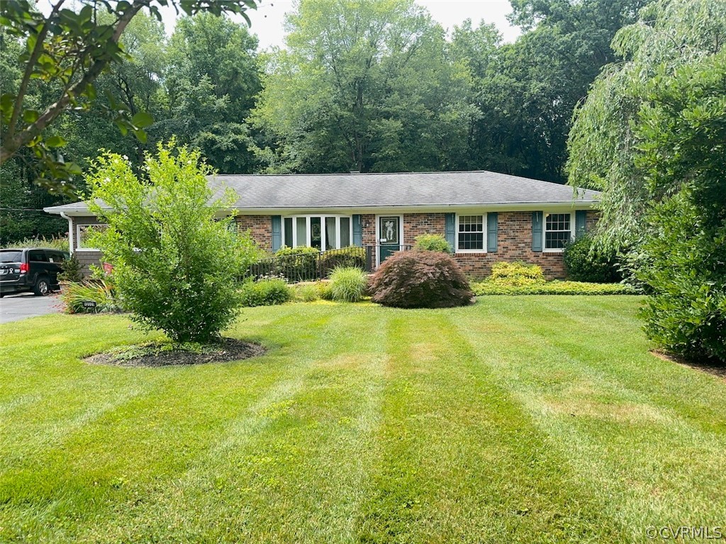 a view of a house with a garden