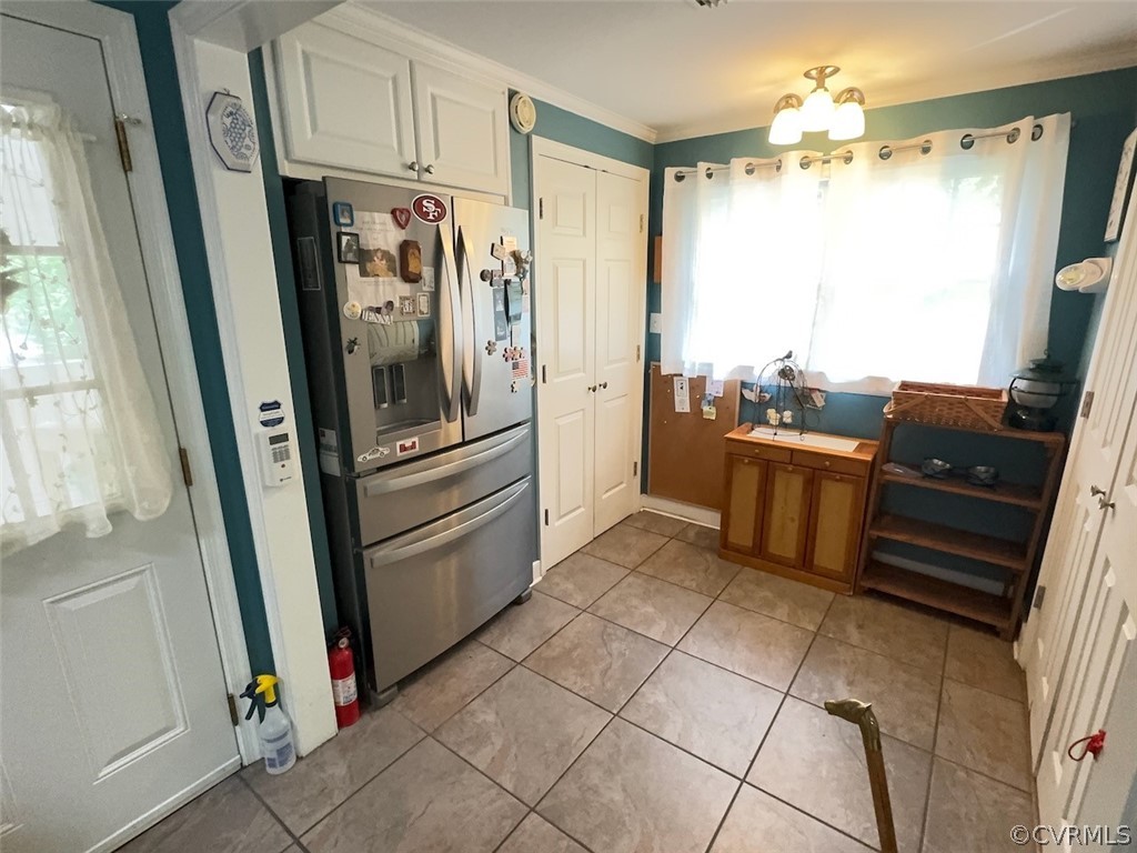 12001 Sunset Drive Ashland, VA 23005 - Photo 11 of 40 a kitchen with stainless steel appliances granite countertop a refrigerator and a sink