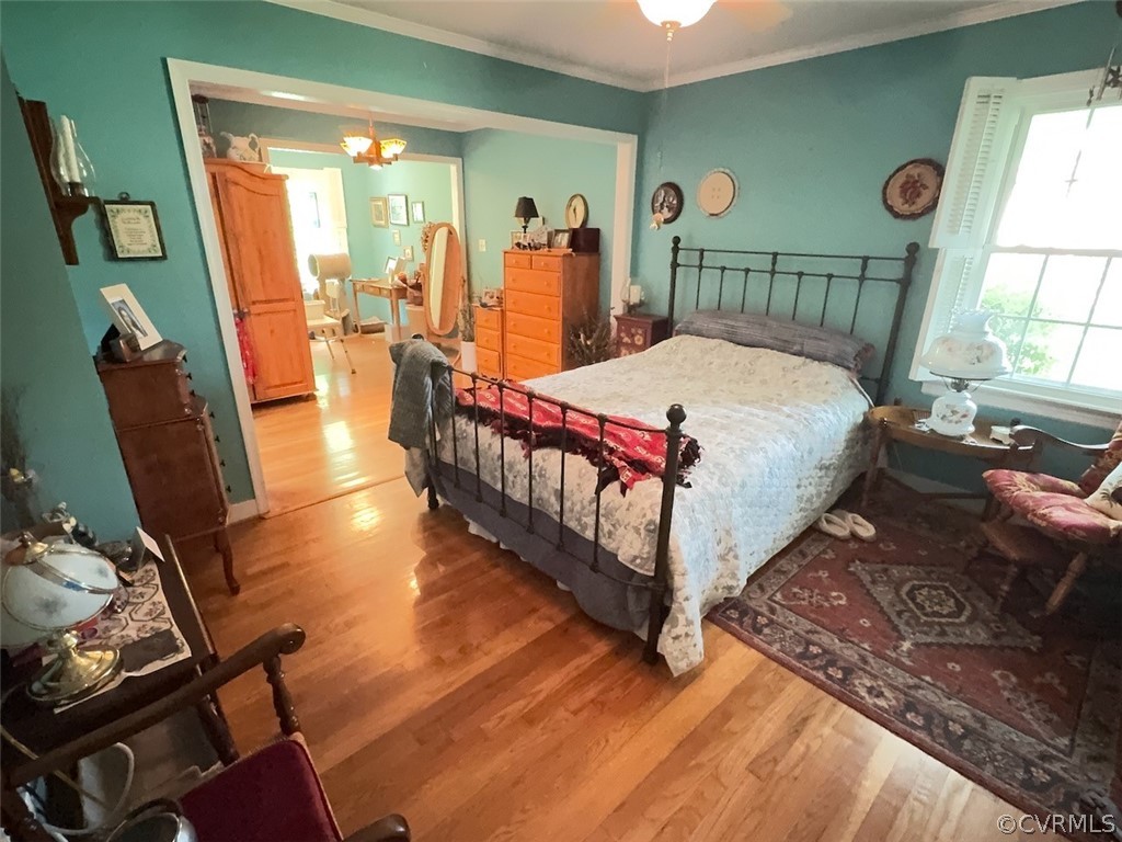 12001 Sunset Drive Ashland, VA 23005 - Photo 15 of 40 a bed sitting in a bedroom next to a window