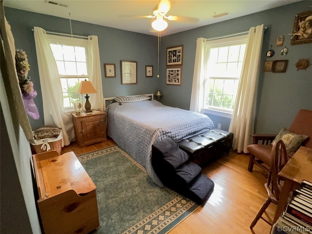 12001 Sunset Drive Ashland, VA 23005 - Photo 19 of 40 a bed room with a bed window and table