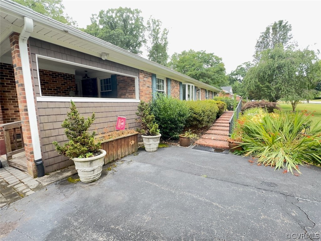 12001 Sunset Drive Ashland, VA 23005 - Photo 33 of 40 a view of a house with a yard and sitting area
