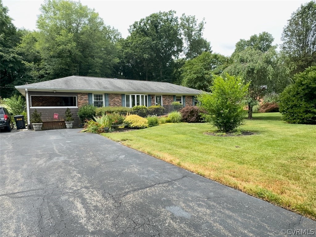 12001 Sunset Drive Ashland, VA 23005 - Photo 40 of 40 a view of a house with backyard and sitting area