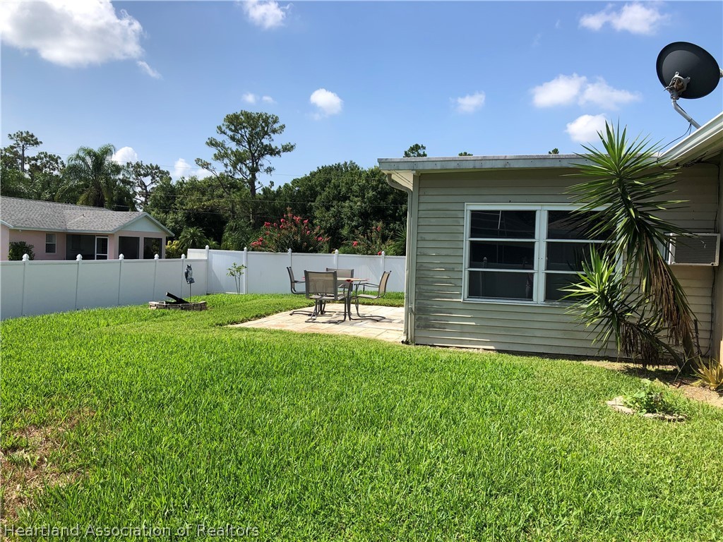 4440 Mandarin Road Sebring, FL 33875 - Photo 17 of 17 a house view with a garden space